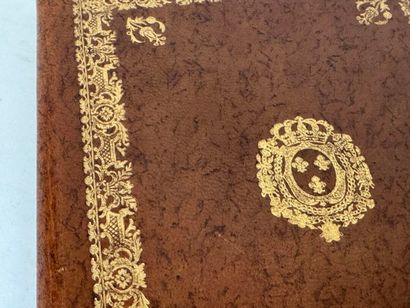Small leather blotter with embossed and gilded...