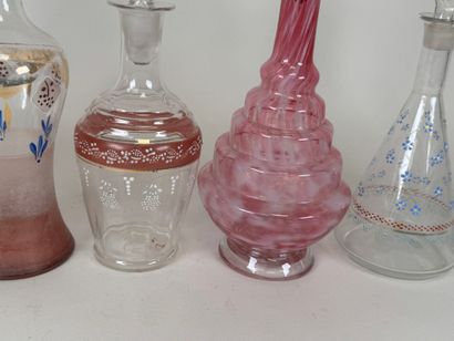 Six carafons en verre à décor émaillé et...
