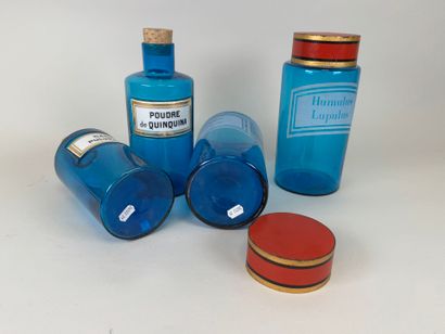 Two pairs of colored glass medicine bottles...