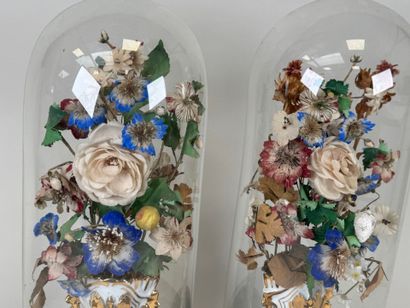 Pair of artificial fabric and natural flowers...