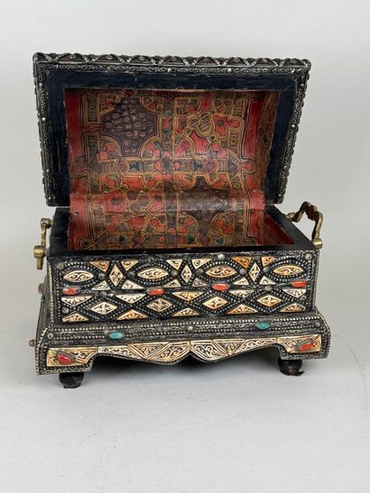 Wooden box covered with copper-alloy metal...