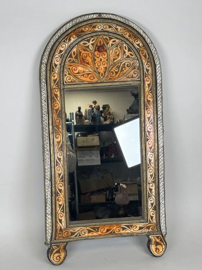 Copper alloy mirror with repoussé decoration...