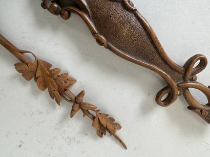 Carved wood letter opener decorated with...