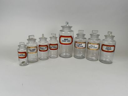 8 clear glass medicine jars.
H. 13-16-19-24...