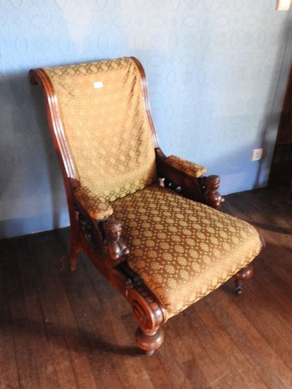Carved mahogany armchair, sphinx-shaped armrests,...