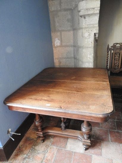Rustic wooden table on casters. 
73 x 113...