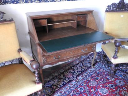 Secretary desk in molded wood opening with...