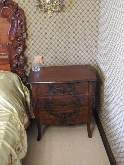 Two rustic bedsides opening with three drawers....