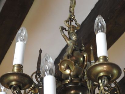 Dutch brass chandelier with twelve arms decorated...
