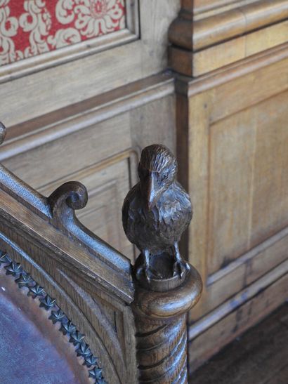 Gothic-style armchair in wood, leather seat....