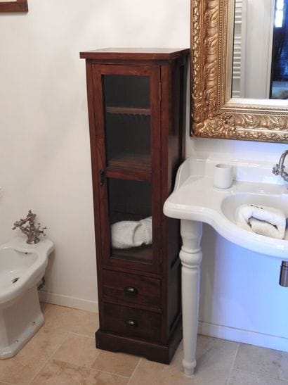 Pair of small wooden storage units opening...