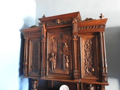 Carved wood sideboard with three doors on...