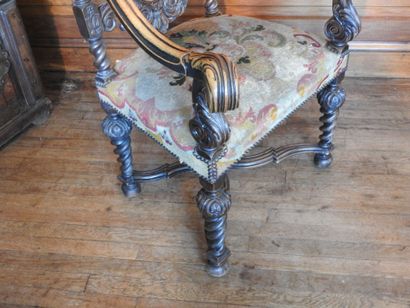 Carved wood armchairs, crook-shaped arms,...