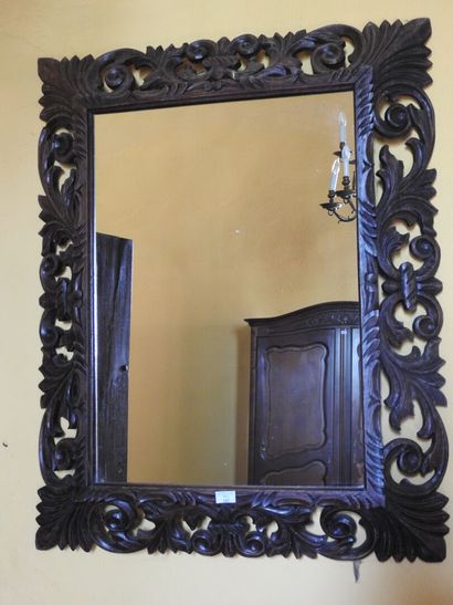 Rectangular carved wood mirror.
20th century.
102...