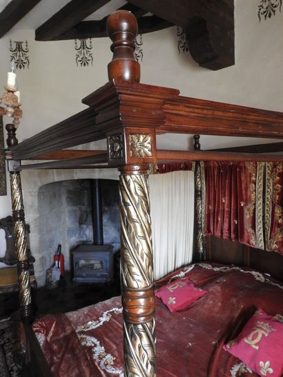 Large canopy bed in wood carved with lion...