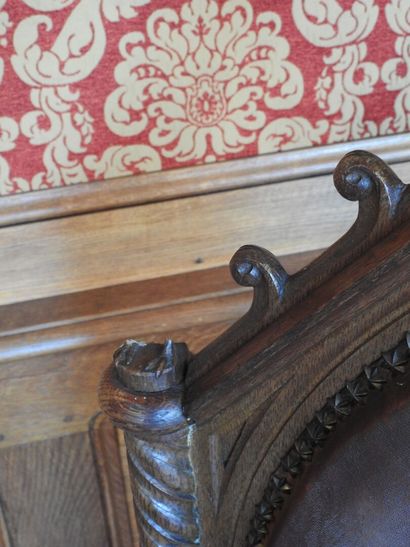 Gothic-style armchair in wood, leather seat....