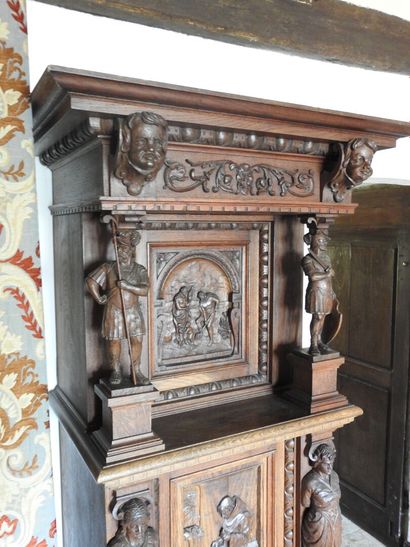 Carved wood cabinet with two doors and a...