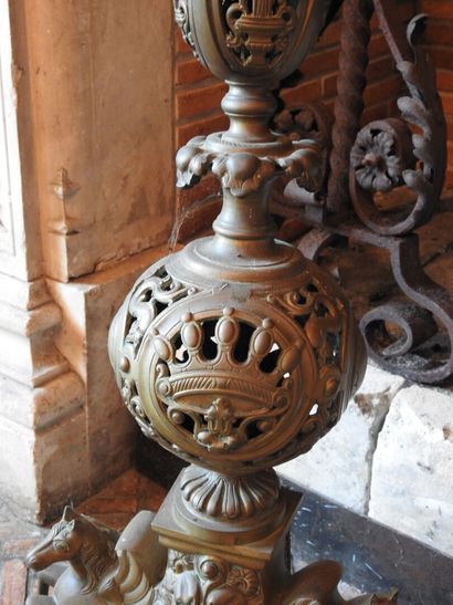 Pair of cast brass andirons with openwork...