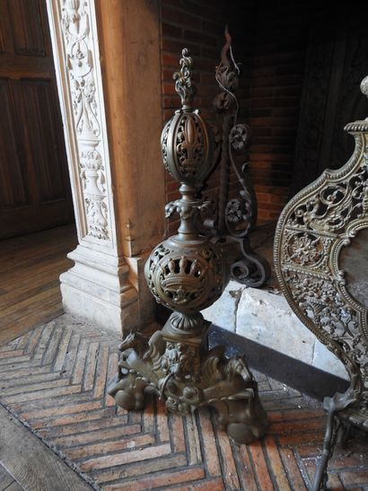 Pair of cast brass andirons with openwork...