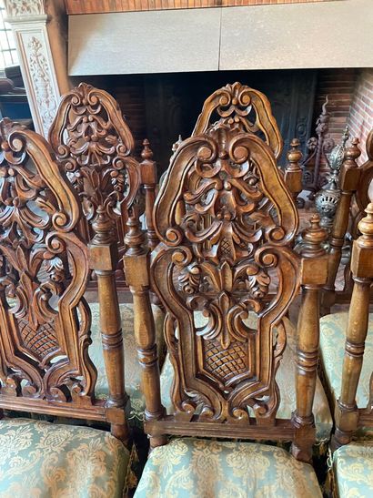 Suite of ten Henri II style chairs in carved...