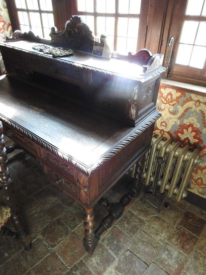 Carved wood stepped desk opening with four...