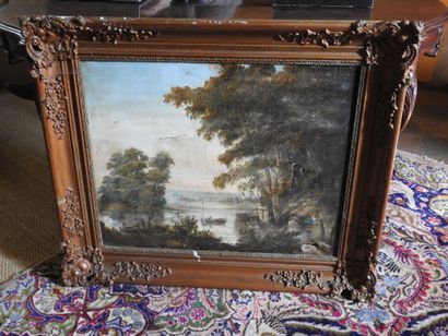 School of the XIXth.
Landscape with a boat.
Oil...