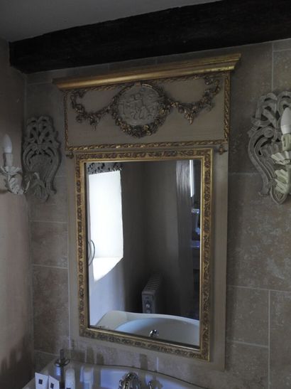Small stuccoed wood mirror, cream lacquered...