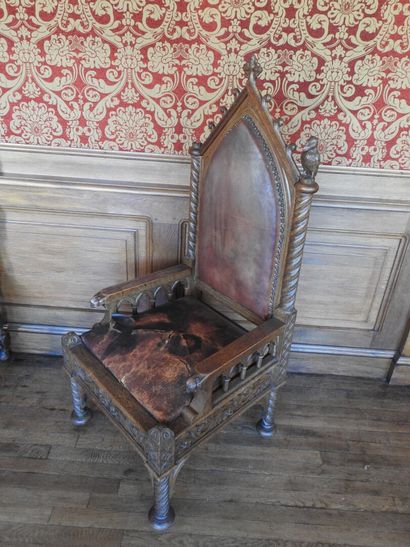 Gothic-style armchair in wood, leather seat....