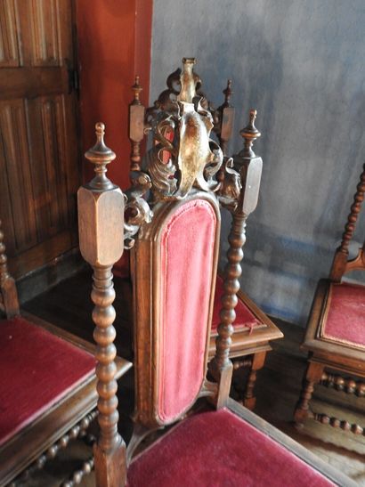 Suite of five Neo-Gothic carved wood chairs,...