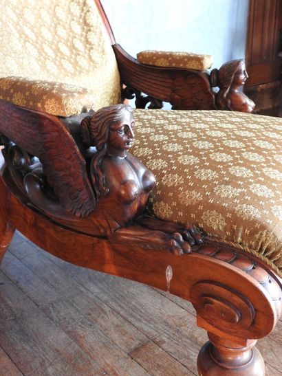 Carved mahogany armchair, sphinx-shaped armrests,...