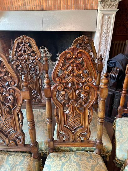 Suite of ten Henri II style chairs in carved...