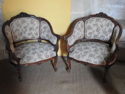 Two carved wood gondola armchairs.
Louis...