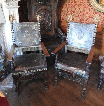 Pair of carved wood armchairs with gilded...