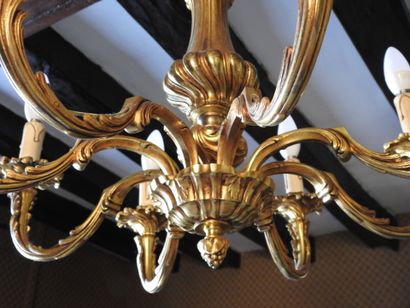 Gilt bronze chandelier with eight arms. 
20th...