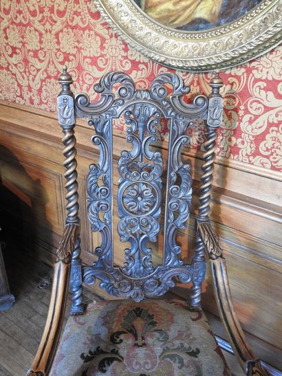 Carved wood armchairs, crook-shaped arms,...