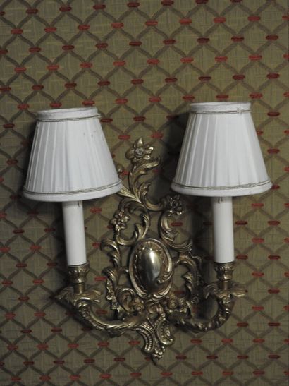 Pair of ormolu two-light sconces. 
Rocaille...