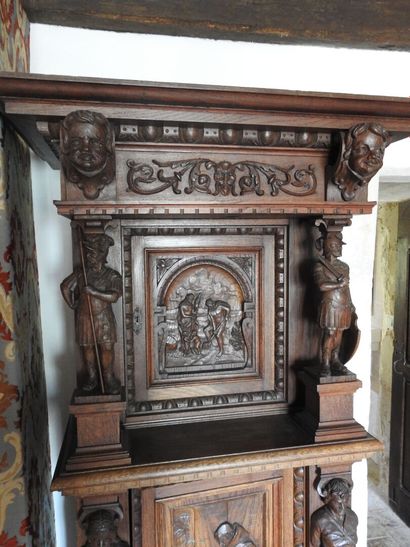 Carved wood cabinet with two doors and a...