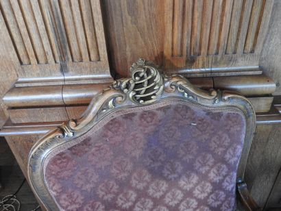 Pair of armchairs in carved and molded wood....
