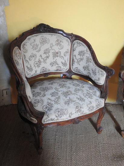 Two carved wood gondola armchairs.
Louis...