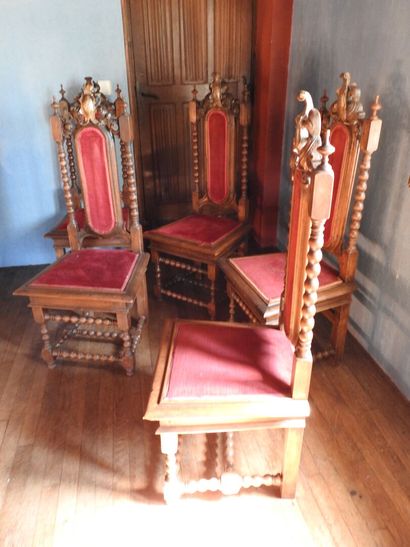 Suite of five Neo-Gothic carved wood chairs,...