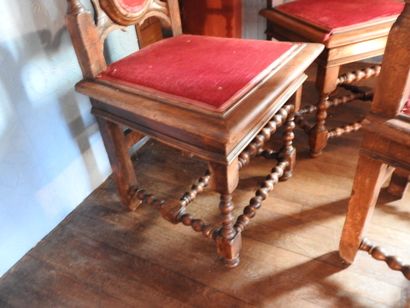 Suite of five Neo-Gothic carved wood chairs,...