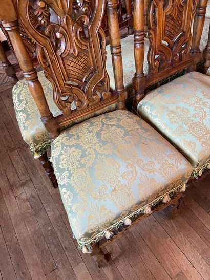 Suite of ten Henri II style chairs in carved...