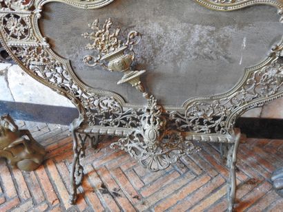 Pair of cast brass andirons with openwork...