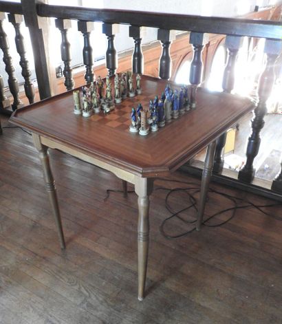 Wooden inlaid game table with foliage decoration...