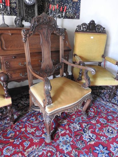 Pair of armchairs in carved oak with patina,...