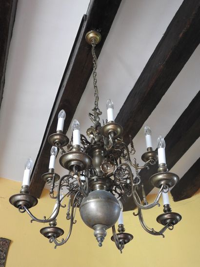 Dutch brass chandelier with twelve arms decorated...