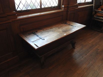 Walnut bench with wrought-iron hinge. 
19th...