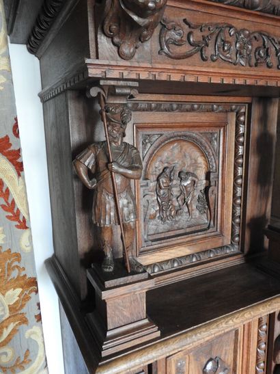 Carved wood cabinet with two doors and a...