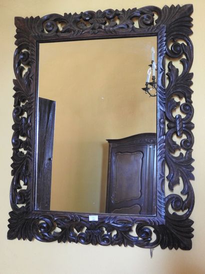 Rectangular carved wood mirror.
20th century.
102...