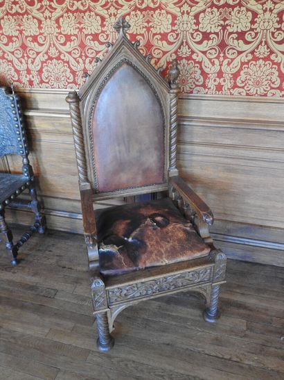Gothic-style armchair in wood, leather seat....